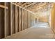 Expansive basement with partial framing and exposed utilities allows for personalized finishing touches at 5526 Brookwood Ln, Hickory, NC 28602