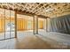 Spacious unfinished basement with exposed ceiling and stud walls offers room for future expansion at 5526 Brookwood Ln, Hickory, NC 28602