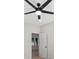 Bedroom with modern ceiling fan, wood floors, and view to additional room at 5526 Brookwood Ln, Hickory, NC 28602