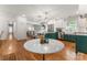 Open kitchen featuring an island with barstool seating and stainless steel appliances at 5533 Murrayhill Rd, Charlotte, NC 28210