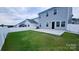 Picture of fenced backyard features patio and new home construction at 5775 Soft Shell Dr # 310, Lancaster, SC 29720