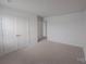 Neutral carpeted bedroom features double door closet and bright natural light at 5775 Soft Shell Dr # 310, Lancaster, SC 29720