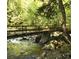 Picture of the bridge over creek surrounded by lush landscaping at 5775 Soft Shell Dr # 310, Lancaster, SC 29720