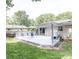 An ample back deck features stylish furniture and a great space for entertaining friends and Gathering at 5909 Ryder Ave, Charlotte, NC 28226