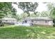Enjoy outdoor living on the back deck in a peaceful backyard at 5909 Ryder Ave, Charlotte, NC 28226