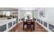 This beautiful dining area offers great natural light and access to the outdoor patio with views of the backyard at 5909 Ryder Ave, Charlotte, NC 28226