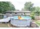 Backyard above-ground pool offers fun for everyone at 5909 Ryder Ave, Charlotte, NC 28226