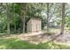 Large storage shed in a shady back yard can hold all your tools at 5909 Ryder Ave, Charlotte, NC 28226