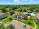 Aerial view featuring community amenities, including a pool, clubhouse, parking, and green space at 6044 Heath Valley Rd, Charlotte, NC 28210