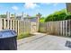Fenced backyard featuring a concrete patio, partial lawn, and room for outdoor seating at 6044 Heath Valley Rd, Charlotte, NC 28210