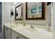 Clean bathroom with a white vanity, decorative mirrors, and modern fixtures at 6044 Heath Valley Rd, Charlotte, NC 28210