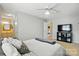 Spacious bedroom with gray walls, comfy bed, and a view into an en-suite bathroom at 6044 Heath Valley Rd, Charlotte, NC 28210