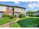 Charming townhouse featuring well-maintained landscaping and a welcoming entrance at 6044 Heath Valley Rd, Charlotte, NC 28210