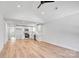 Open concept living space boasts modern flooring, vaulted ceiling, and white shaker cabinets at 707 W Davidson Ave, Gastonia, NC 28052