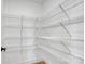 Walk-in pantry with custom shelving provides ample storage space in this modern home at 707 W Davidson Ave, Gastonia, NC 28052