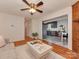 Spacious living area with hardwood floors, neutral decor, open layout to kitchen and dining, and natural light at 713 Springfield Nw Dr, Concord, NC 28027
