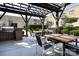Outdoor grilling area with dining tables and manicured landscaping at 720 Governor Morrison St # 221, Charlotte, NC 28211
