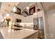 Kitchen area with stainless steel appliances, granite countertops, and pendant lights at 720 Governor Morrison St # 221, Charlotte, NC 28211