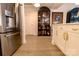 Kitchen view with stainless steel refrigerator and marble counter tops at 720 Governor Morrison St # 221, Charlotte, NC 28211