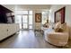 Bright living room with large windows and a neutral color palette at 720 Governor Morrison St # 221, Charlotte, NC 28211