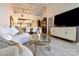 Bright, open floor plan featuring a comfortable living room that flows into a modern dining and kitchen space at 720 Governor Morrison St # 221, Charlotte, NC 28211
