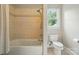 Bathroom with shower-tub combo and a window at 748 Land Fall Dr, Rock Hill, SC 29732