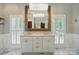 Bright and spacious bathroom features double vanity, a large mirror, and abundant natural light at 748 Land Fall Dr, Rock Hill, SC 29732