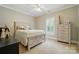 Comfortable bedroom with natural light, neutral walls, and plush carpet at 748 Land Fall Dr, Rock Hill, SC 29732