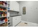 Well-organized laundry room with shelves and cabinets offering ample storage space at 748 Land Fall Dr, Rock Hill, SC 29732