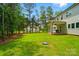 Expansive backyard featuring lush green lawn and mature trees at 7818 Russell Rd, Indian Trail, NC 28079