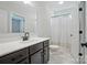 Stylish bathroom featuring a modern vanity and a shower-tub combination at 7818 Russell Rd, Indian Trail, NC 28079