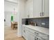 Convenient butler's pantry with countertop space and extra storage cabinetry at 7818 Russell Rd, Indian Trail, NC 28079