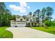 Inviting two-story home with a spacious driveway and attached three-car garage at 7818 Russell Rd, Indian Trail, NC 28079