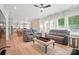 Cozy living room with hardwood floors and neutral-toned furniture at 7818 Russell Rd, Indian Trail, NC 28079