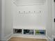 Convenient mudroom with built-in bench, storage cubbies, and hooks at 7818 Russell Rd, Indian Trail, NC 28079