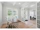 Stylish home office with french doors and ample natural light at 7818 Russell Rd, Indian Trail, NC 28079