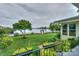 Expansive backyard showcasing lush lawn and tranquil waterfront views at 7945 Placid Ct, Denver, NC 28037