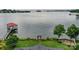 Expansive lake view with gazebo and lush landscaping from this waterfront property at 7945 Placid Ct, Denver, NC 28037