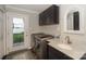 Laundry room with sink, washing machine and dryer and water views at 7945 Placid Ct, Denver, NC 28037