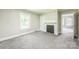 Cozy bedroom featuring neutral walls, carpet, and decorative fireplace with mantle at 807 3Rd St, Kings Mountain, NC 28086