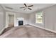 Bedroom with neutral walls, decorative fireplace and ceiling fan at 807 3Rd St, Kings Mountain, NC 28086