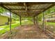 Carport area with a view to backyard and greenery, providing outdoor protection and access at 807 3Rd St, Kings Mountain, NC 28086