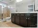 Bathroom features double vanity and glass enclosed shower at 8115 Kelburn Ln, Charlotte, NC 28273