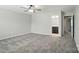 Bedroom with ensuite bathroom and neutral carpeting at 8115 Kelburn Ln, Charlotte, NC 28273
