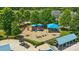 Overhead view of the community playground with shade, multiple play structures and swings at 8115 Kelburn Ln, Charlotte, NC 28273