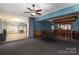 Finished basement with bar, tile, and carpeting flooring, ideal for entertainment and relaxation at 8593 Bailey Dr, Terrell, NC 28682