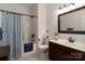 Bathroom with shower/tub combination, vanity, and neutral colors at 8593 Bailey Dr, Terrell, NC 28682