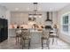 Stylish kitchen featuring a central island with seating, modern appliances, and elegant finishes throughout at 8593 Bailey Dr, Terrell, NC 28682