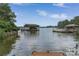 This lake view features boat docks and boat houses along the shoreline at 8593 Bailey Dr, Terrell, NC 28682