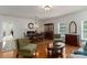 Open-concept living area with hardwood floors, a fireplace, and ample seating for Gathering and friends at 8593 Bailey Dr, Terrell, NC 28682